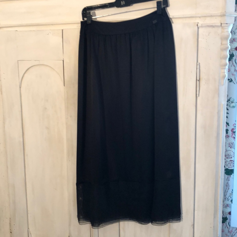 Authentic Chanel, Silk Black skirt.  Size 8